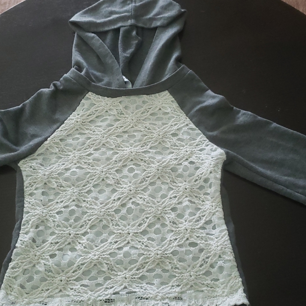 Grey hoodie with flower cutout.